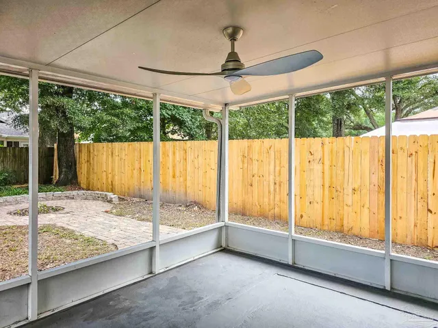 a view of an empty room and window