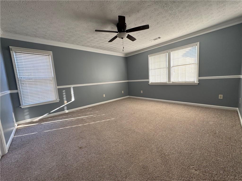 3205 Ivy Station Drive Duluth, GA 30096 - Photo 18 of 38 a view of room with a ceiling fan and window
