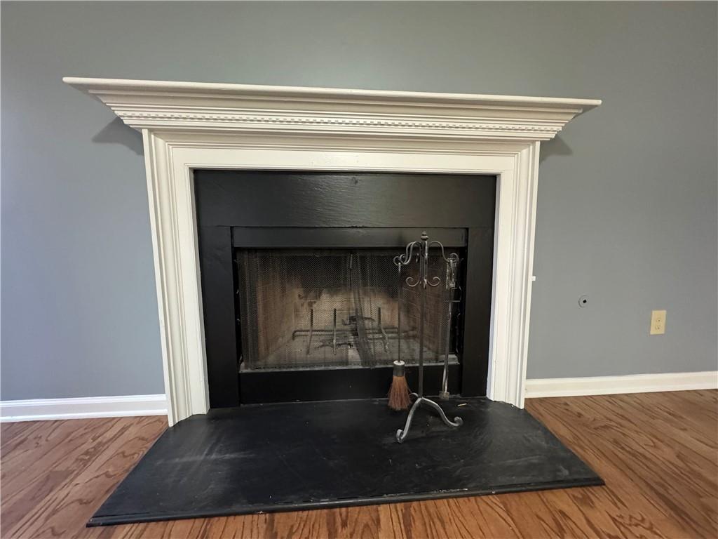 3205 Ivy Station Drive Duluth, GA 30096 - Photo 30 of 38 a living room with a fireplace