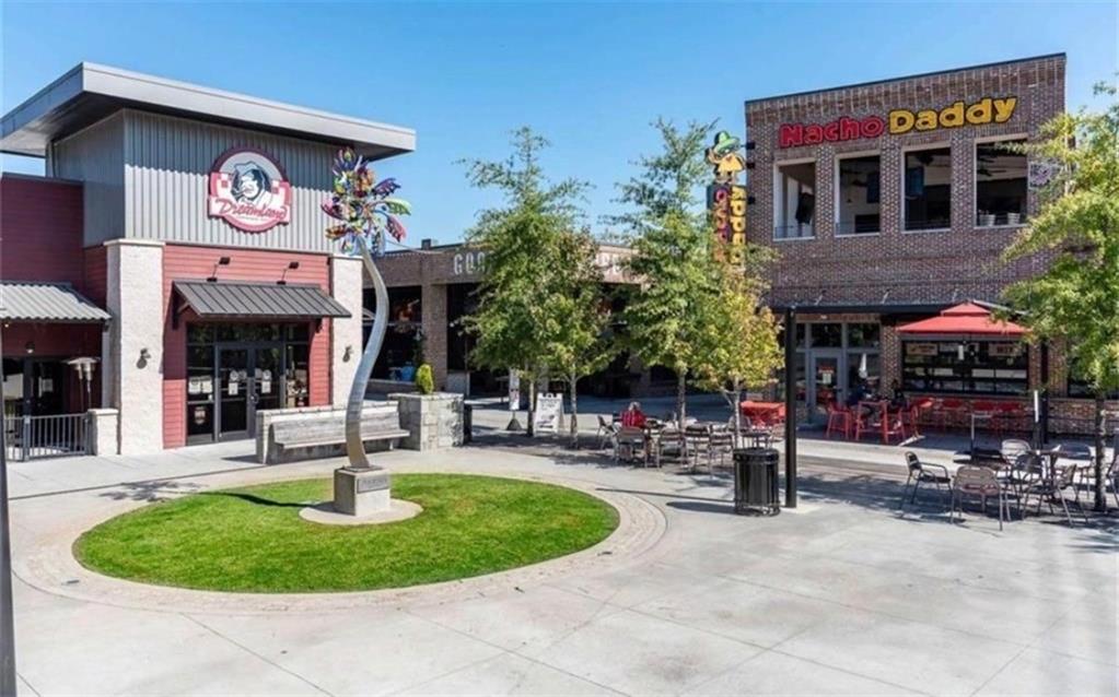 3205 Ivy Station Drive Duluth, GA 30096 - Photo 32 of 38 a front view of a building with sitting area