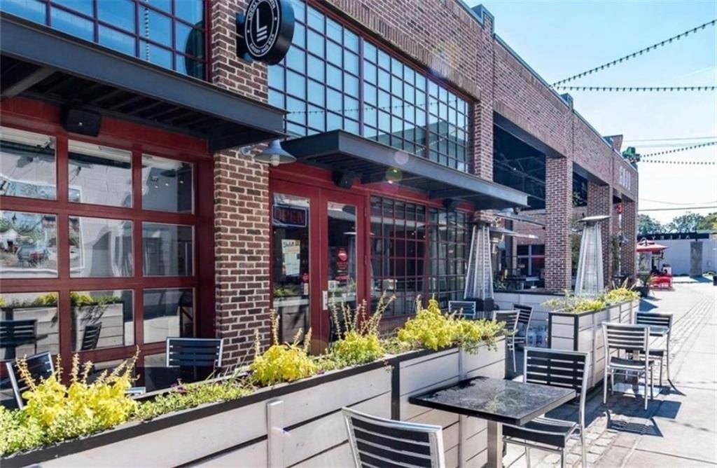 3205 Ivy Station Drive Duluth, GA 30096 - Photo 33 of 38 a view of a chairs and table in the patio