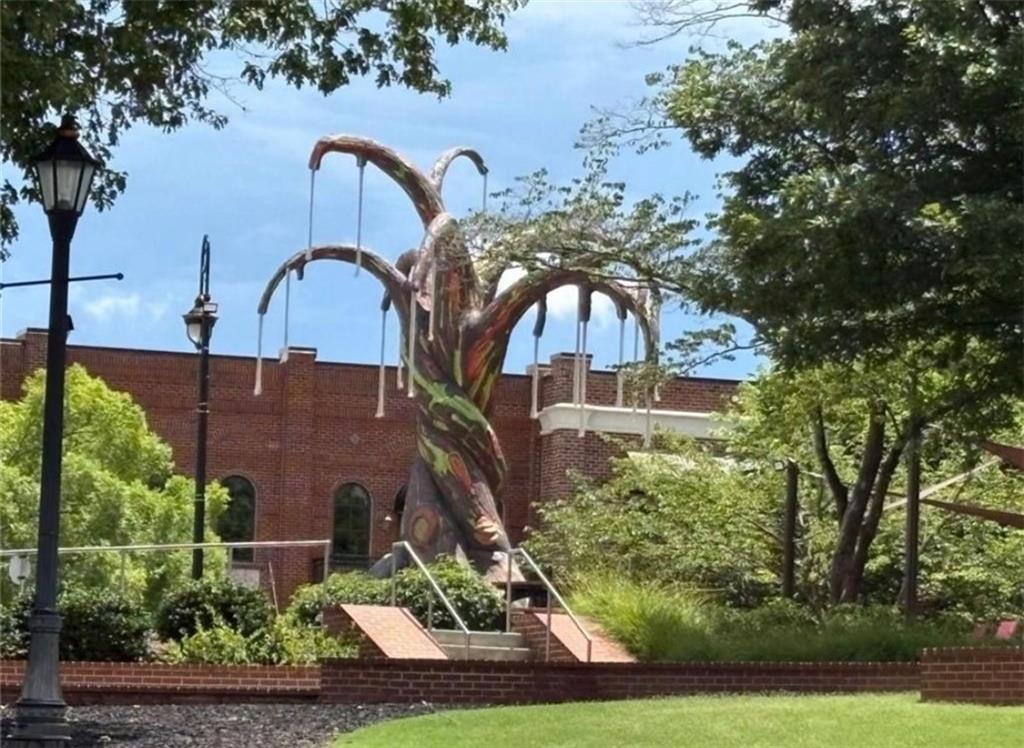 3205 Ivy Station Drive Duluth, GA 30096 - Photo 35 of 38 a front view of a house with garden