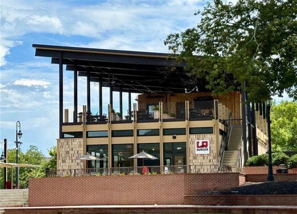 3205 Ivy Station Drive Duluth, GA 30096 - Photo 37 of 38 a front view of a house with garden
