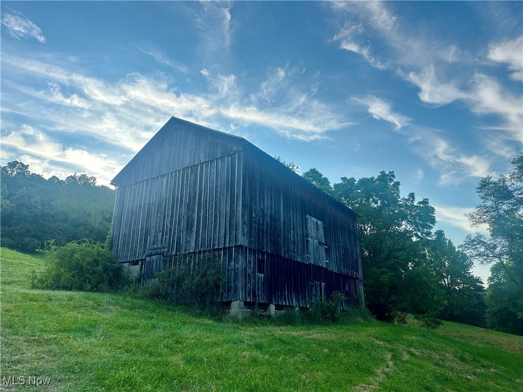 200 Frakes Road Lower Salem, OH 45745 - Photo 9 of 50 View of barn featuring a lawn