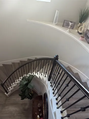 a view of staircase with a table