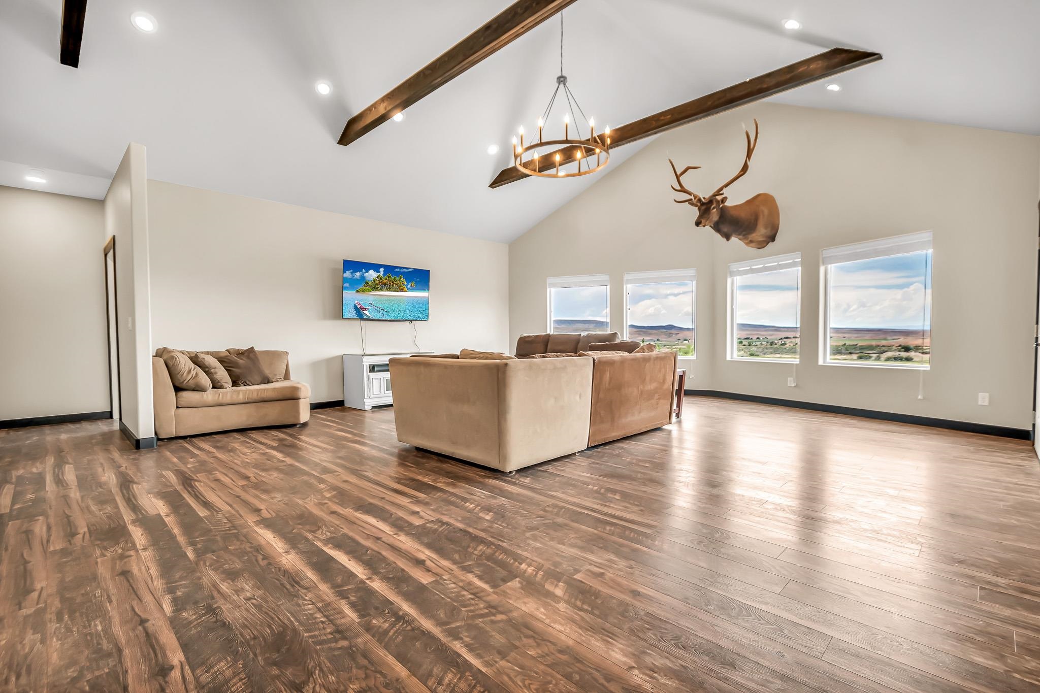 1705 10 Road Mack, CO 81525 - Photo 7 of 22 a living room with furniture and a ceiling fan