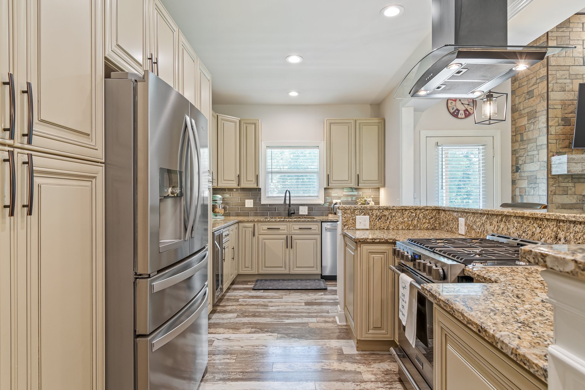 1685 Center Star Road Columbia, TN 38401 - Photo 18 of 68 a kitchen with a refrigerator and a sink