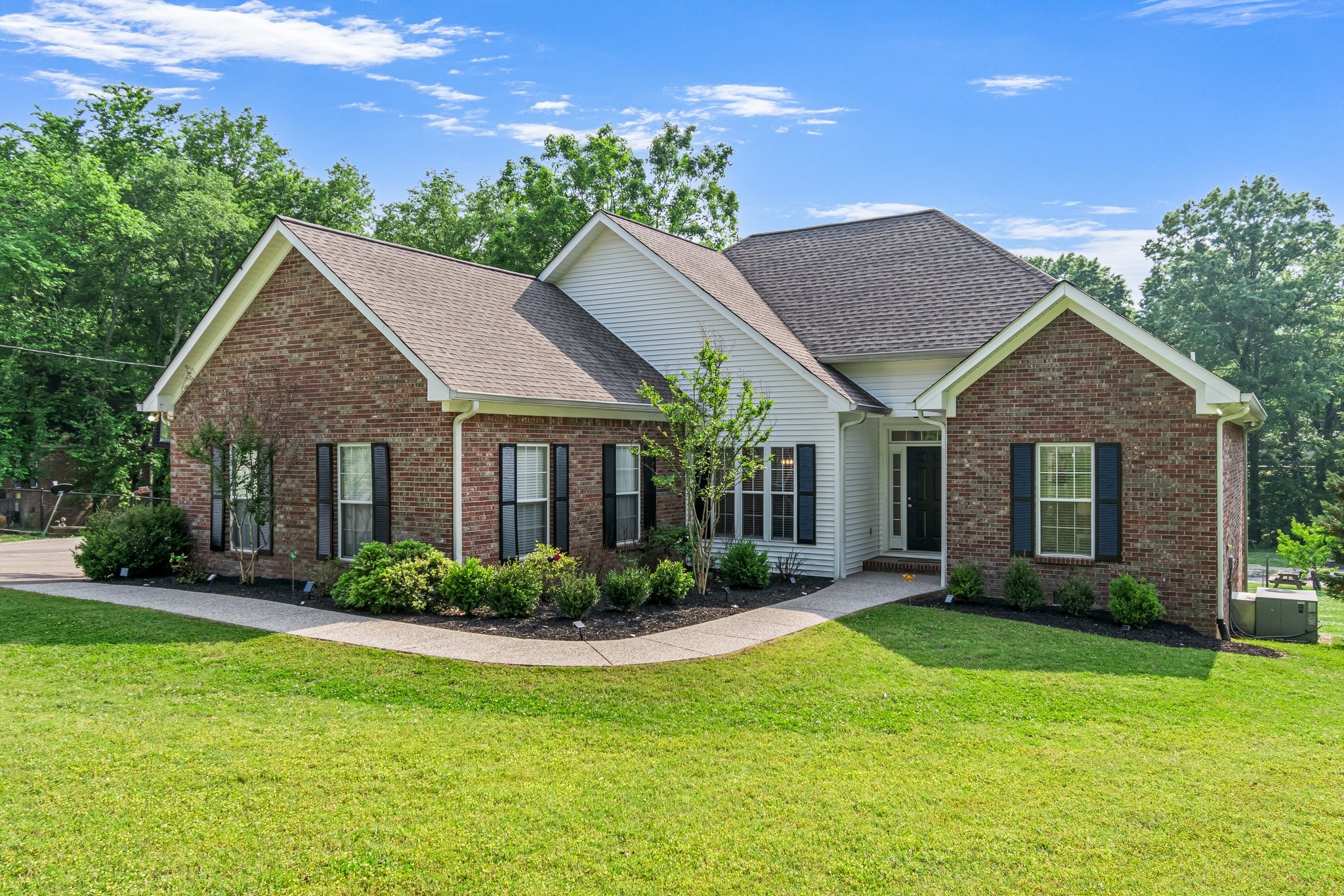 1685 Center Star Road Columbia, TN 38401 - Photo 2 of 68 a front view of house with yard and green space