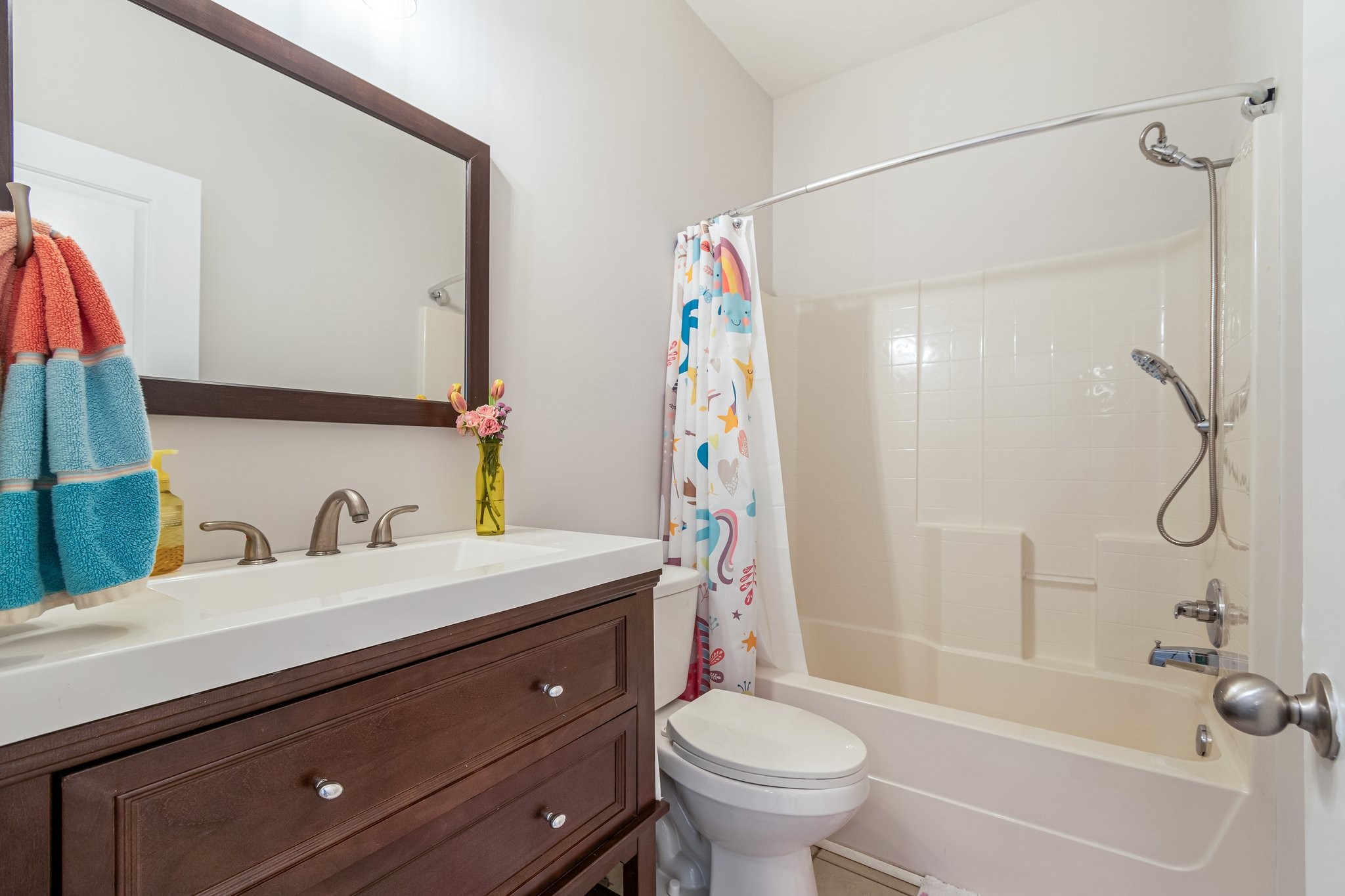 1685 Center Star Road Columbia, TN 38401 - Photo 34 of 68 a bathroom with a sink vanity mirror bathtub and toilet