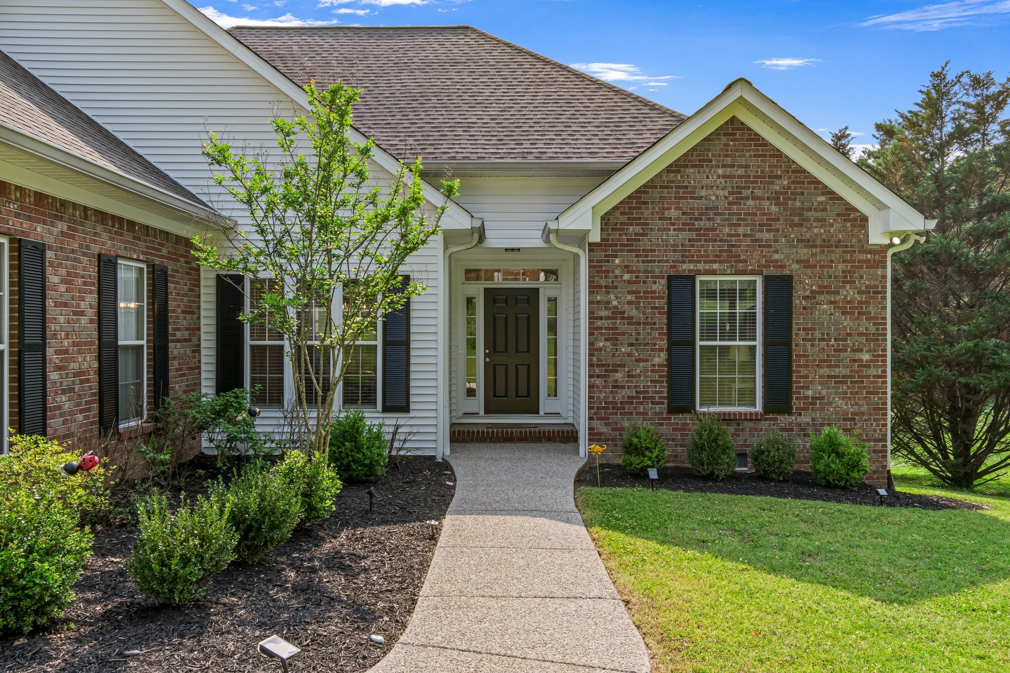 1685 Center Star Road Columbia, TN 38401 - Photo 4 of 68 a front view of a house with garden