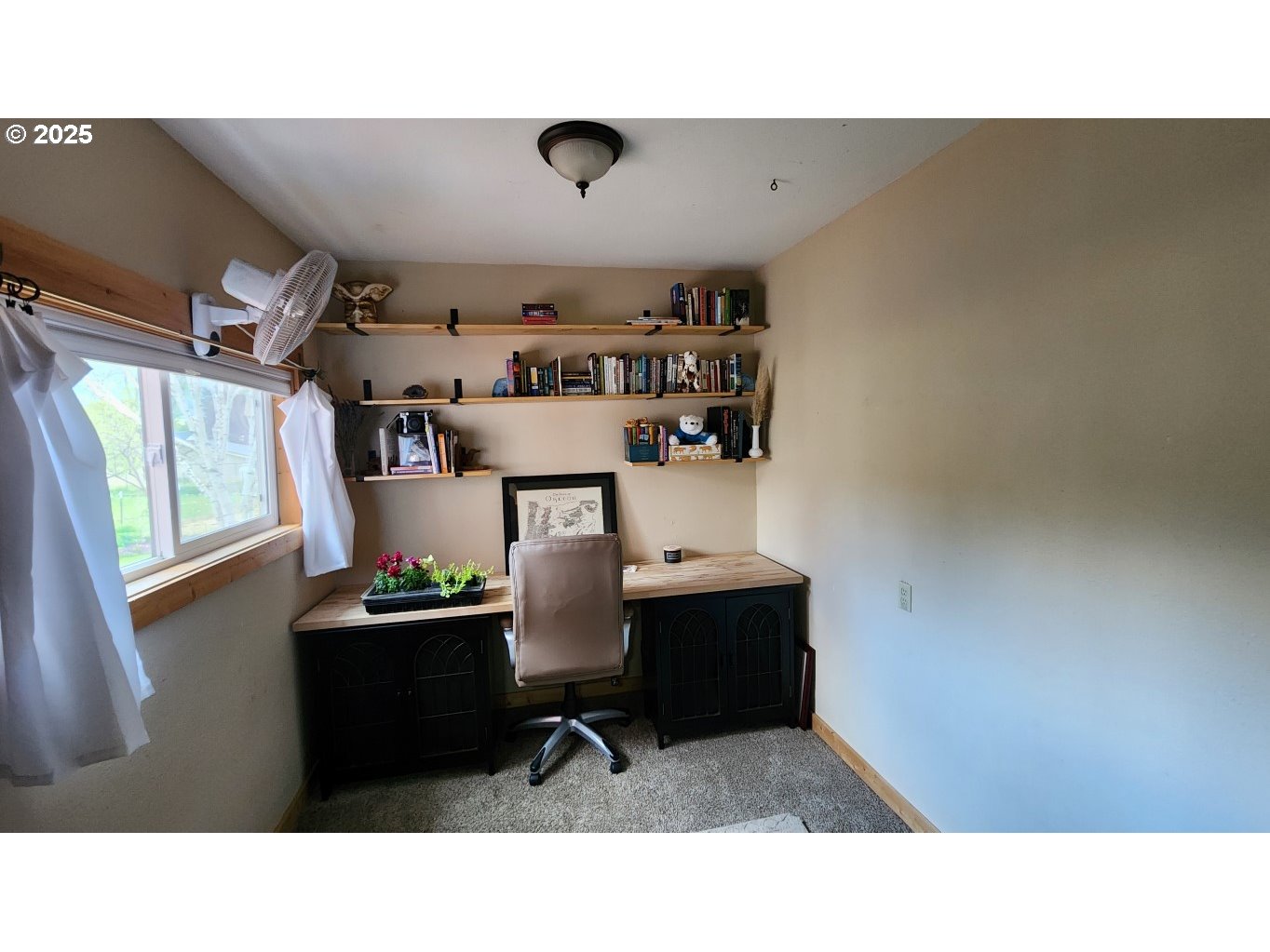 404 Southwest Depot Street Enterprise, OR 97828 - Photo 11 of 32 a living room with a couch and a piano table