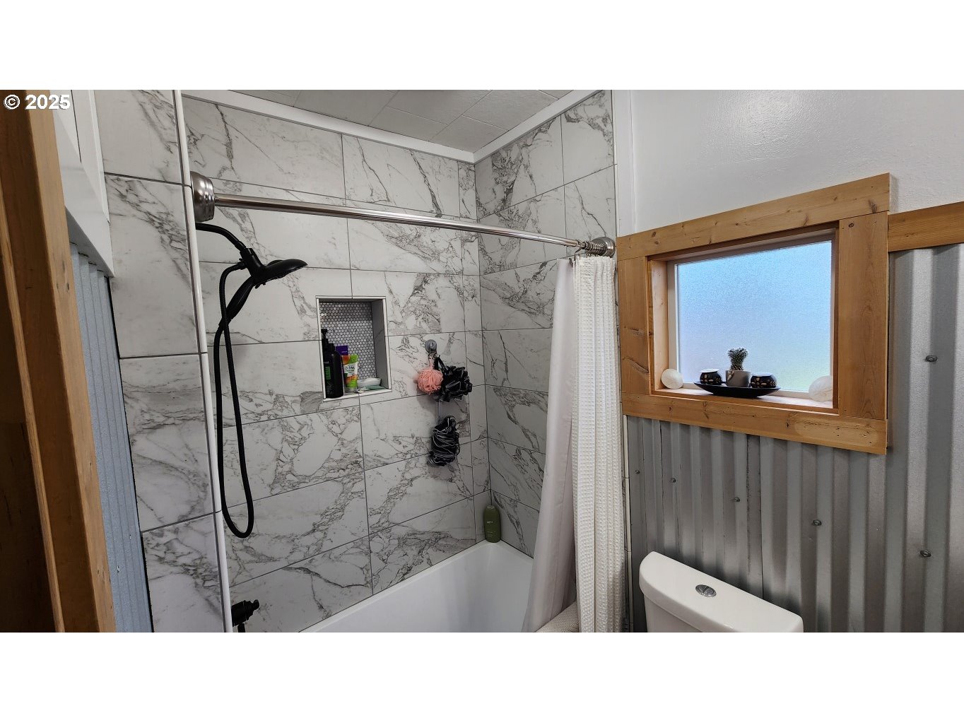 404 Southwest Depot Street Enterprise, OR 97828 - Photo 13 of 32 a bathroom with a sink and a shower