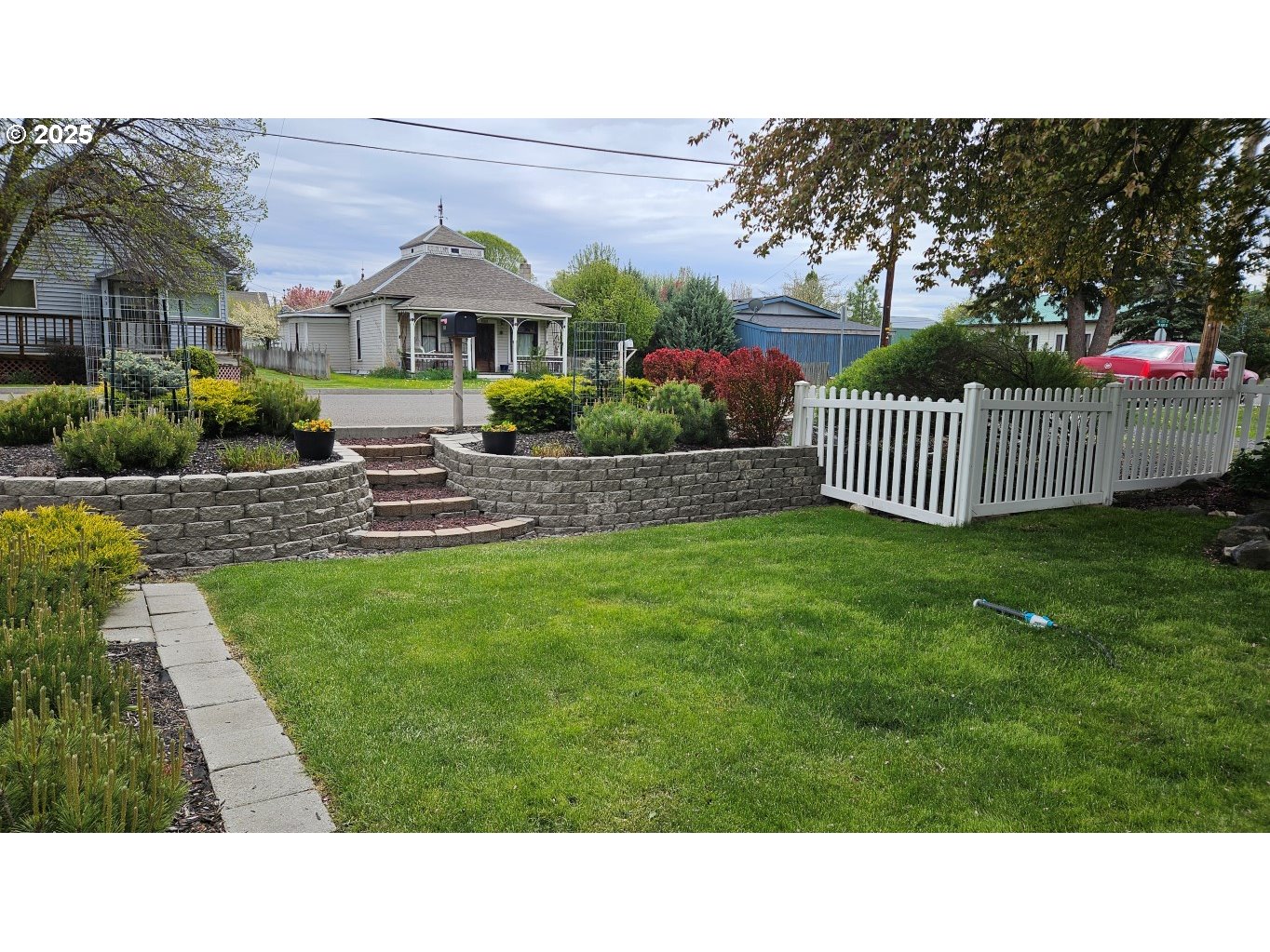 404 Southwest Depot Street Enterprise, OR 97828 - Photo 2 of 32 a black and white photo of a garden