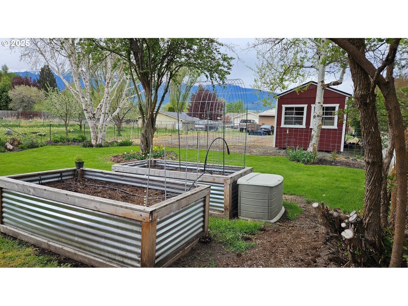 404 Southwest Depot Street Enterprise, OR 97828 - Photo 21 of 32 a view of a backyard with wooden fence