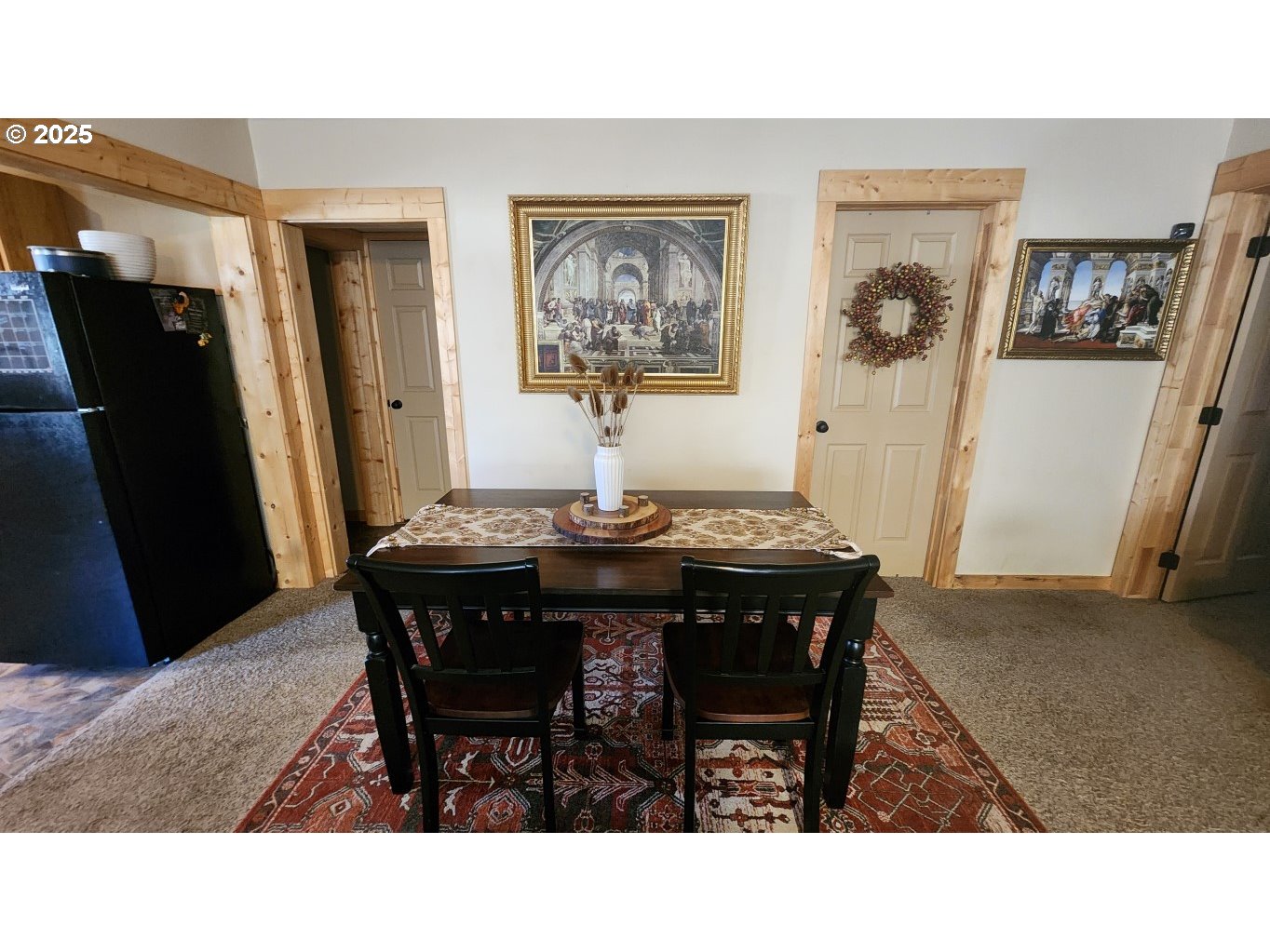 404 Southwest Depot Street Enterprise, OR 97828 - Photo 5 of 32 a kitchen with a dining table and chairs