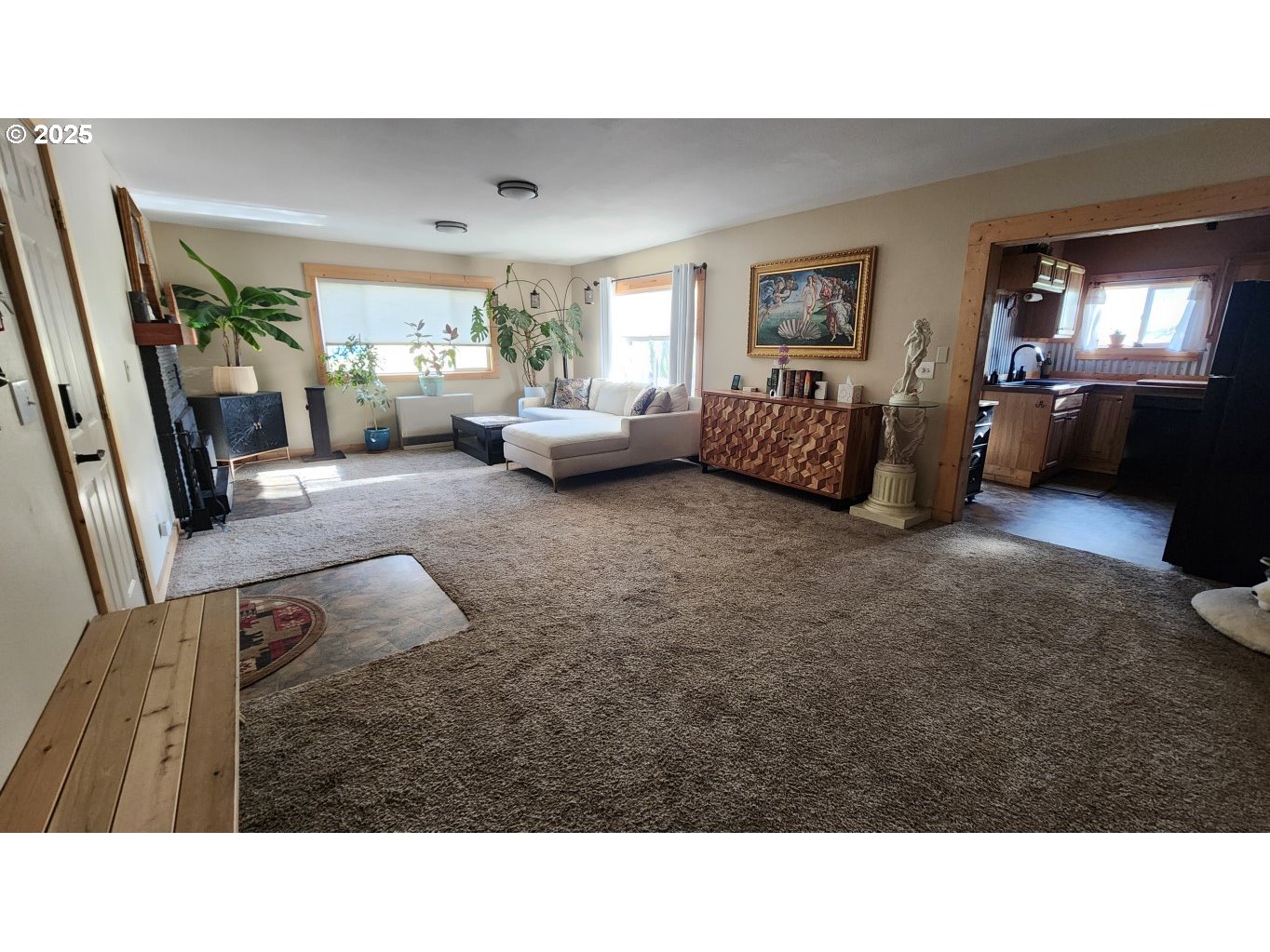 404 Southwest Depot Street Enterprise, OR 97828 - Photo 6 of 32 a living room with furniture and a mirror