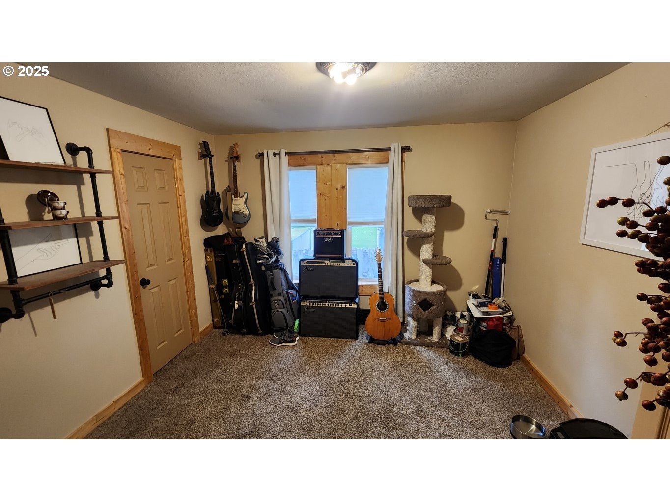 404 Southwest Depot Street Enterprise, OR 97828 - Photo 10 of 32 a living room with furniture and a large window