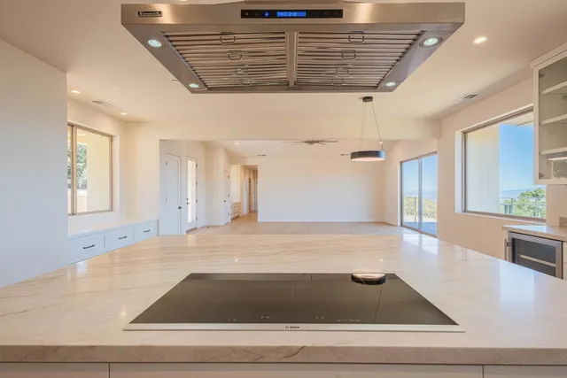 a view of entryway and hall with a bath tub
