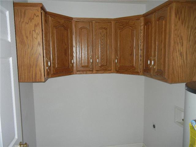 367 Brandon Road Manchester, TN 37355 - Photo 6 of 10 Cabinets over the Washer / Dryer area a huge spacesaver and a great hideaway for cleaning products.