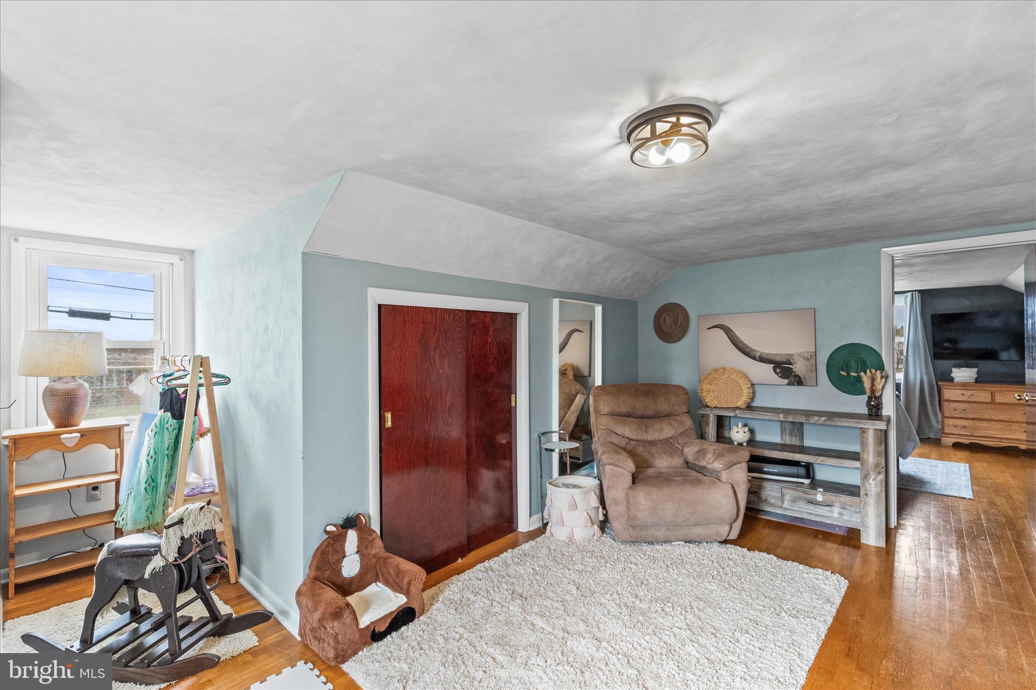 1709 Jefferson Road Spring Grove, PA 17362 - Photo 21 of 39 a bedroom with furniture and a chandelier
