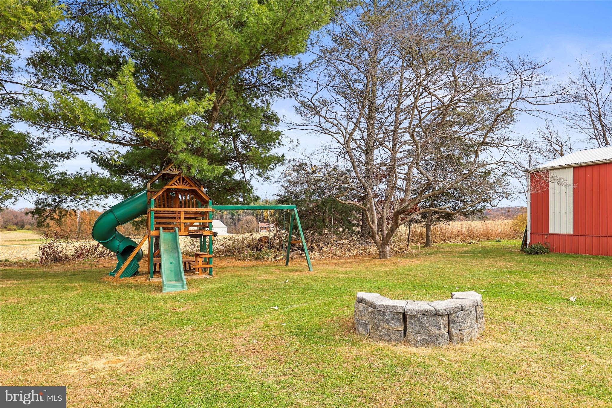 1709 Jefferson Road Spring Grove, PA 17362 - Photo 32 of 39 a view of a playground with a slide and swing