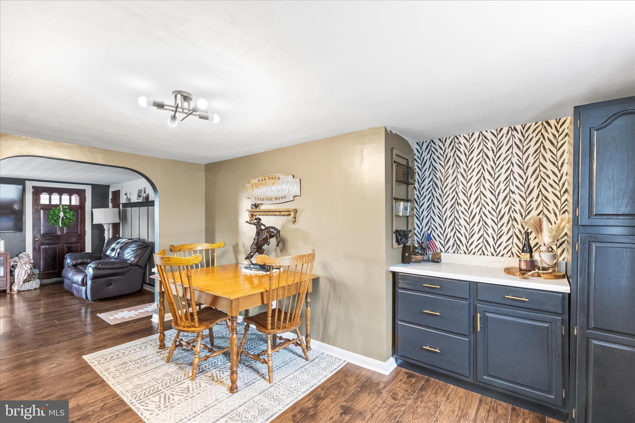 1709 Jefferson Road Spring Grove, PA 17362 - Photo 9 of 39 a view of a dining room with furniture window and wooden floor