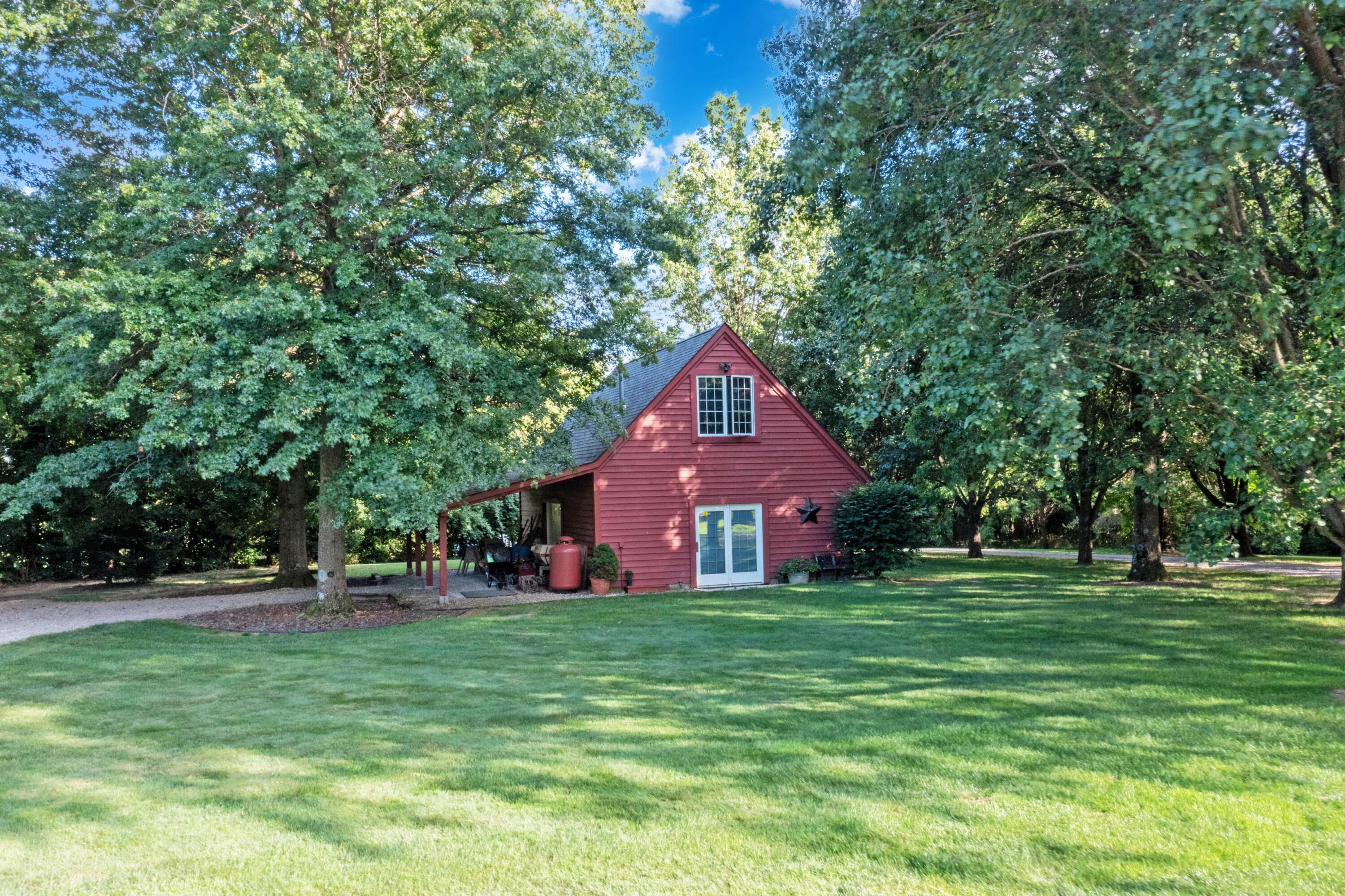 6262 Duffy Road Delaware, OH 43015 - Photo 59 of 96 • New roof ~ 2018
• Fully insulated
• Wood exterior
• Concrete floor
• Finished walls & ceiling
• (5) sets of french doors
• (1) garage door
• Lean-to with gravel base