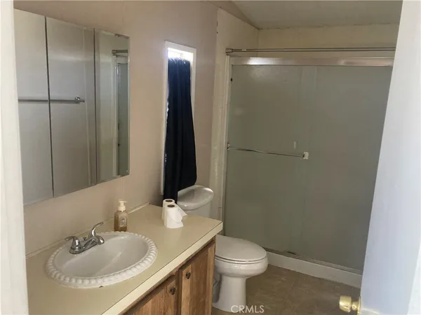 a kitchen with a refrigerator stove and a sink