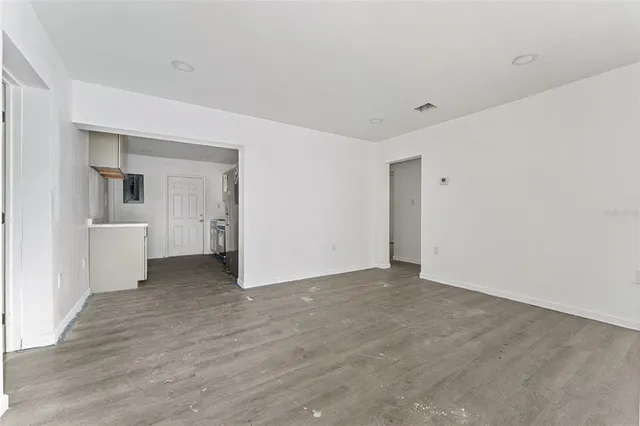 a view of a room with a sink and a bathroom
