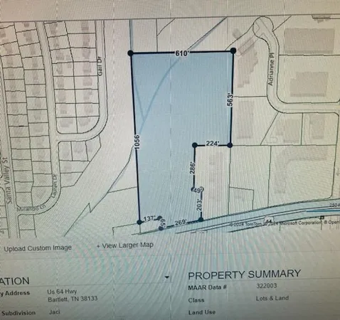 a view of a yard with plants