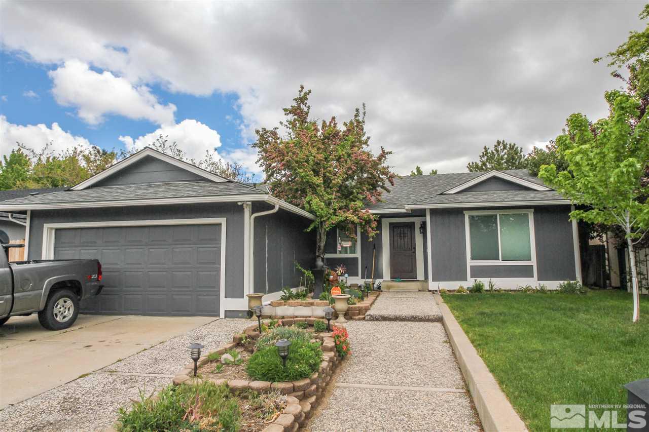 1940 Quail Run Road Reno, NV 89523 - Photo 1 of 1 a front view of a house with garden