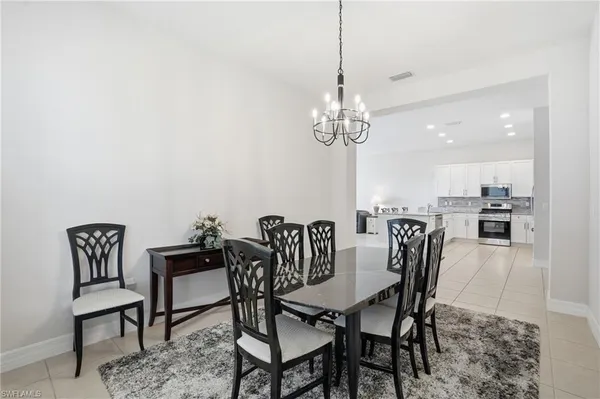 a view of a dining room with furniture