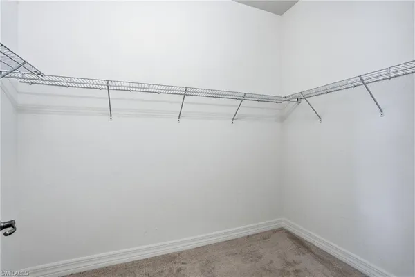 a view of a room with racks on the wall