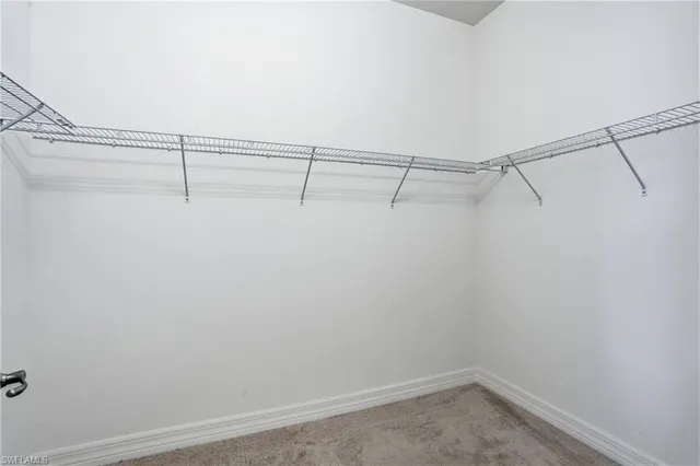 a view of a room with racks on the wall