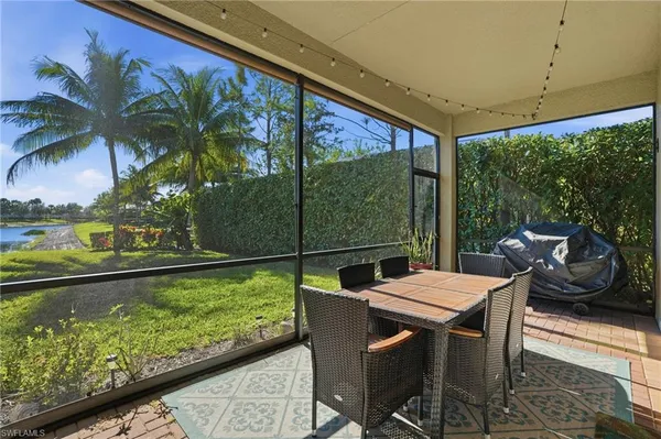 a view of an outdoor dining space with furniture