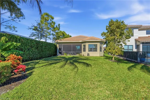 a view of a lake with a big yard