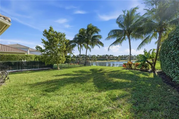 a view of outdoor space with swimming pool and seating