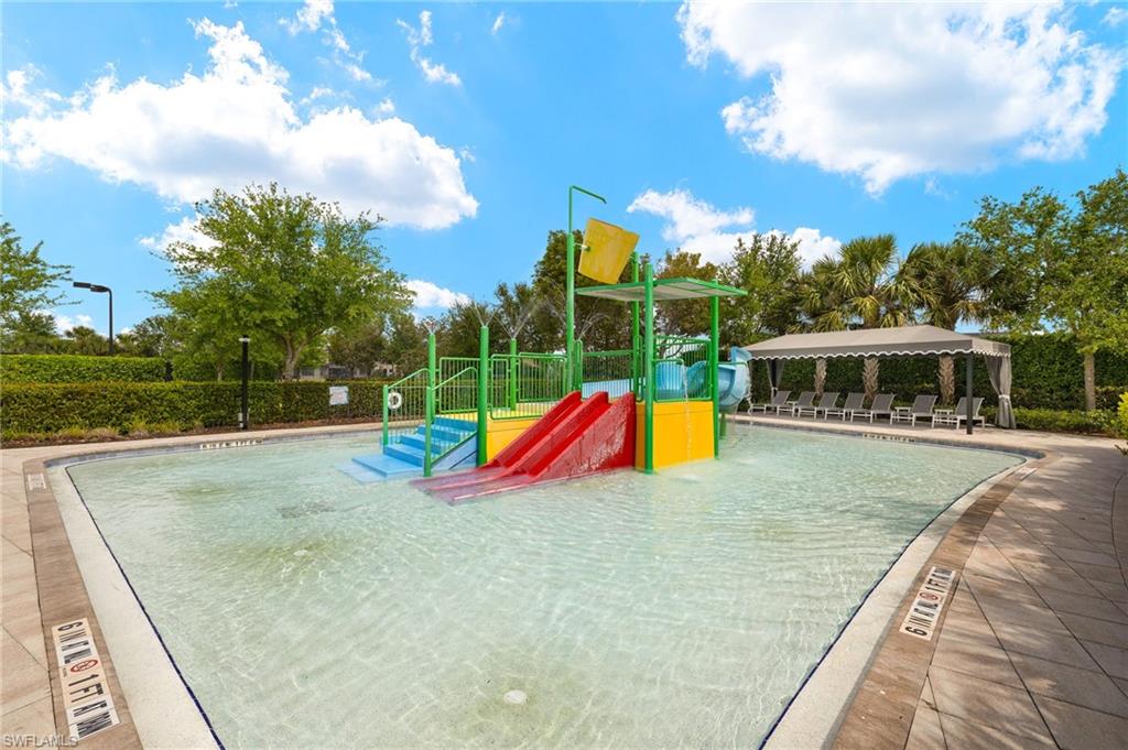 4194 Amelia Way Naples, FL 34119 - Photo 41 of 44 View of playground featuring a patio area