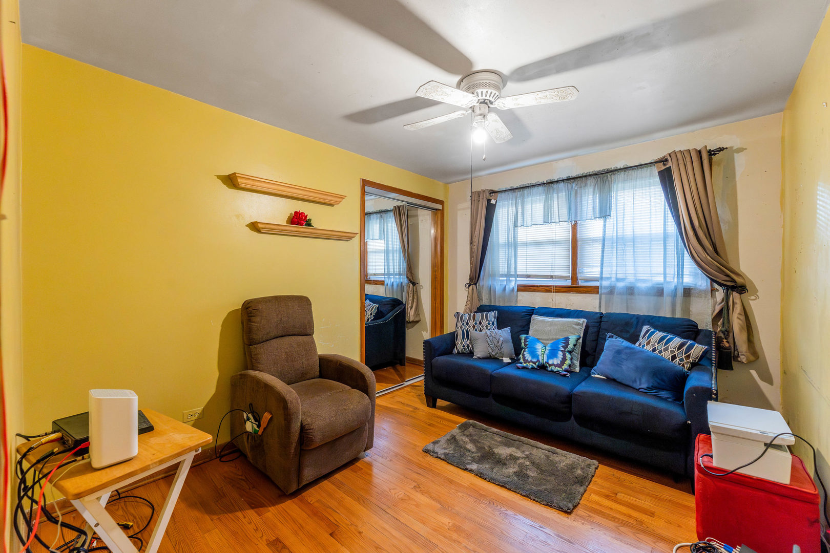 2117 West 71st Place Chicago, IL 60636 - Photo 15 of 31 a living room with furniture and a window