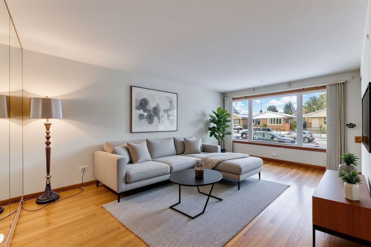 2117 West 71st Place Chicago, IL 60636 - Photo 5 of 31 a living room with furniture and a large window