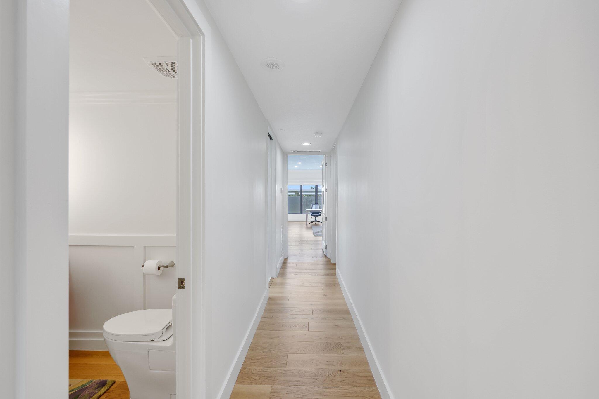 3900 North Ocean Boulevard, Unit LANAI Delray Beach, FL 33483 - Photo 16 of 40 a bathroom with a sink and toilet