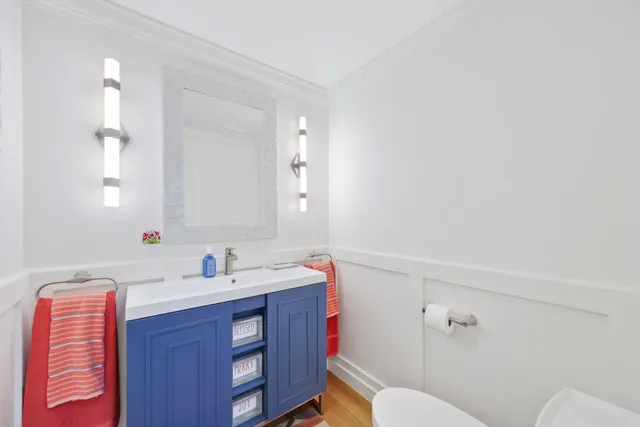 a bed room with a bed and glass door