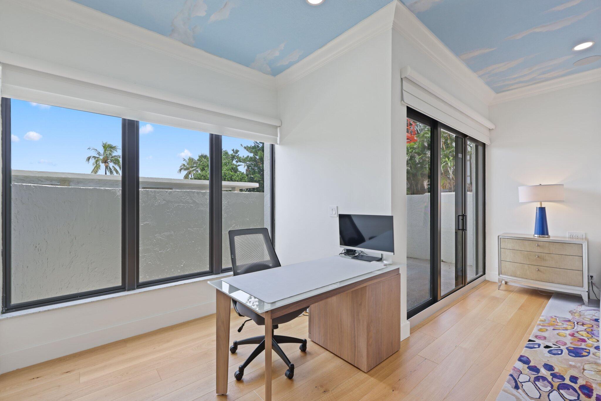 3900 North Ocean Boulevard, Unit LANAI Delray Beach, FL 33483 - Photo 20 of 40 a view of a workspace with furniture and window