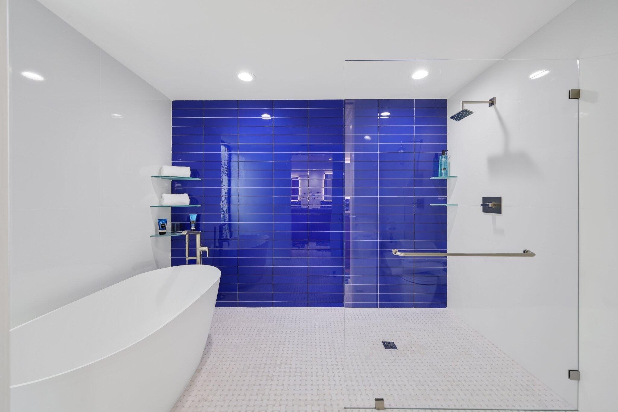 3900 North Ocean Boulevard, Unit LANAI Delray Beach, FL 33483 - Photo 23 of 40 a bathroom with a shower and a toilet