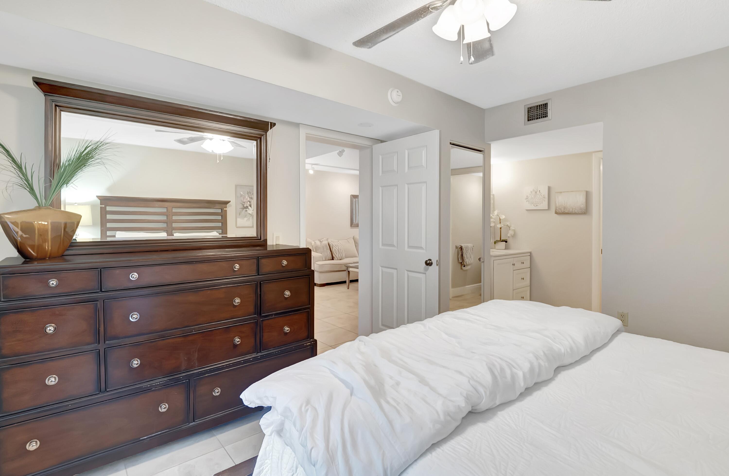 6097 Balboa Circle, Unit 103 Boca Raton, FL 33433 - Photo 21 of 31 Primary Bedroom