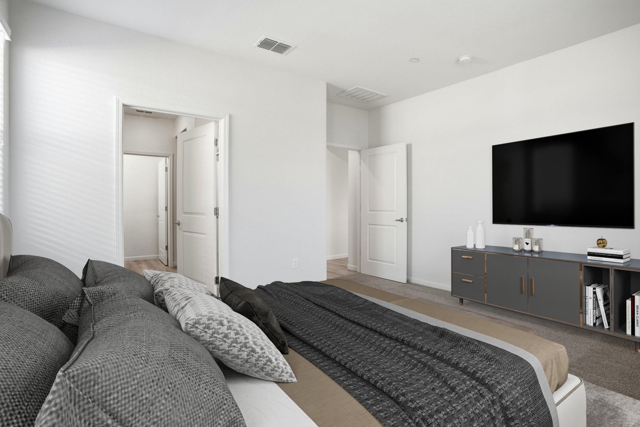 2055 Stars Drive Rio Vista, CA 94571 - Photo 22 of 43 a bedroom with a bed and a flat screen tv on dresser and a flat screen tv