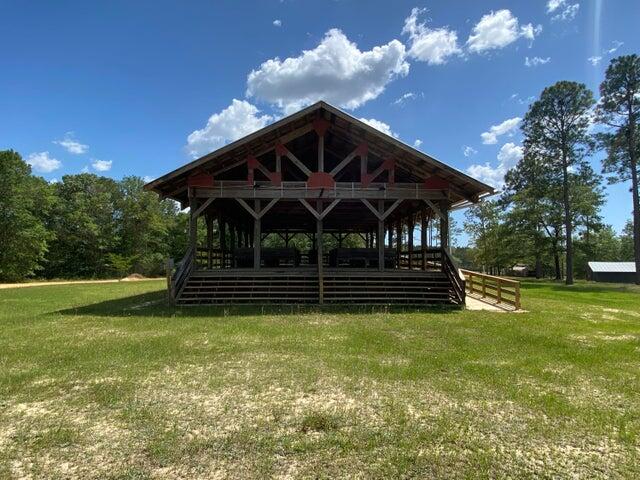 Tbd Tbd Southern Comfort Way Laurel Hill, FL 32567 - Photo 8 of 10 a view of a house with a yard