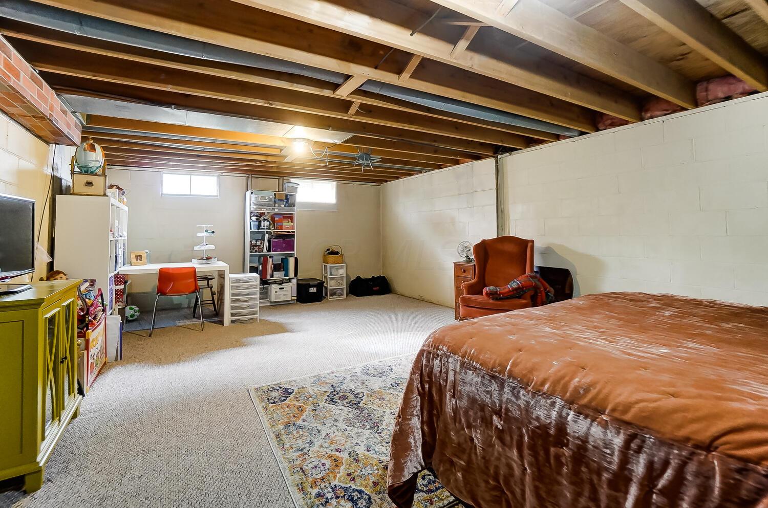 3100 Dunloe Road Columbus, OH 43232 - Photo 23 of 30 The opportunities are endless in this full basement! Use for additional sleeping space for guests, a rec room, storage, or more!