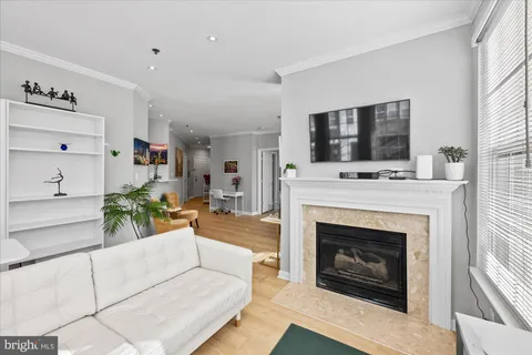 a kitchen with stainless steel appliances granite countertop a refrigerator sink and microwave