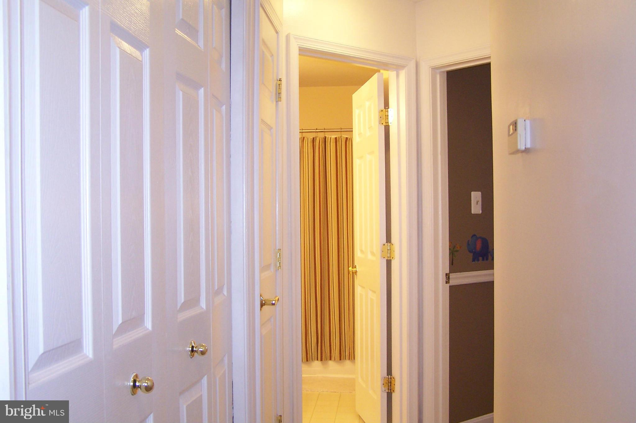 12149 Amber Ridge Circle Germantown, MD 20876 - Photo 21 of 30 hallway to second bedroom and bath
